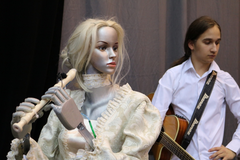 Robot ELSA and guitar player