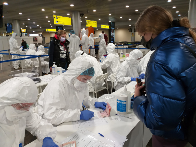 Passengers undergoing a health examination in Moscow's Sheremetyevo airport. Credit: Zoooom at depositphotos.com
