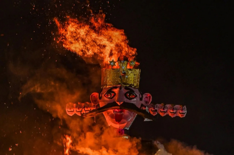 An effigy of Ravana burns during Dussehra celebrations in New Delhi. Photo by Prakash Singh/AFP
