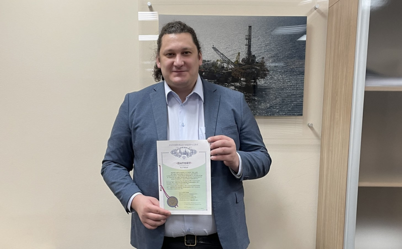 Yegor Sokolov with a patent for an electronic documentation system. Photo courtesy of Ilya Livshits.
