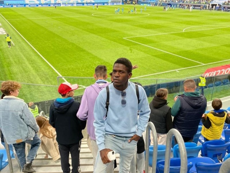 Nathan living his dream of watching a football match at the Gazprom Arena. Photo courtesy of the subject
