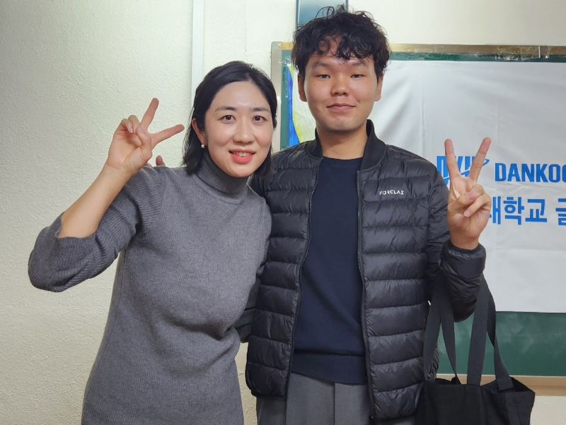 Tugsbilguun with one of his lecturers at Dankook University. Photo courtesy of the subject
