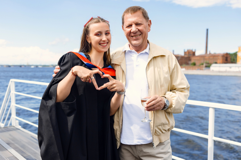 ITMO Rector Vladimir Vasilyev with an ITMO graduate on the boat. Credit: ITMO Mediaportal
