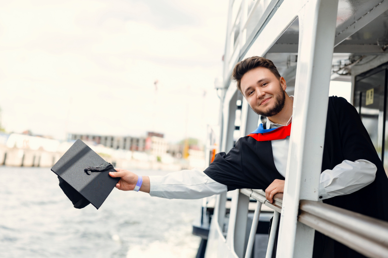 An ITMO graduate on the boat. Credit: ITMO Mediaportal
