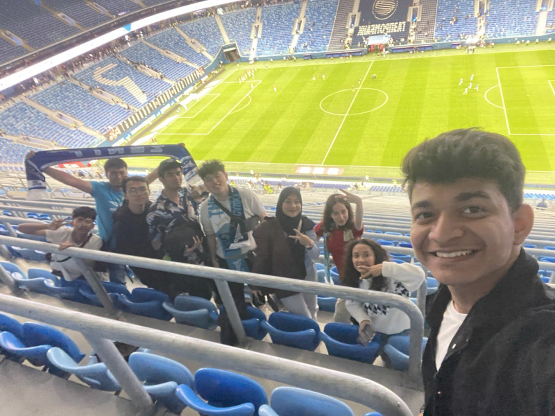 Yash enjoying a football match with his friends at Gazprom Arena. Photo courtesy of the subject
