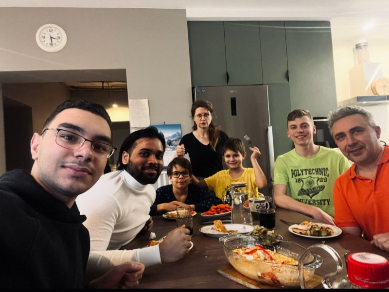 Remo at a Russian family dinner with his friends. Photo courtesy of the subject
