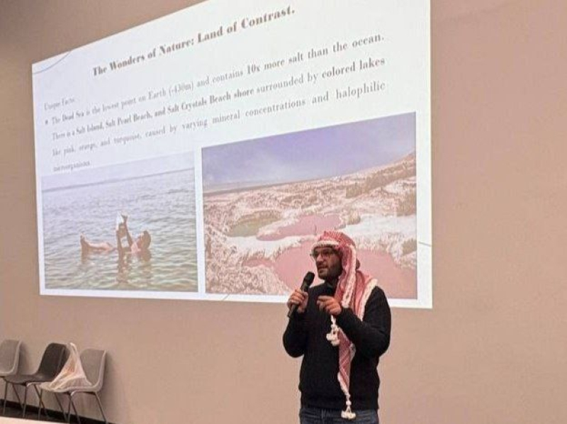 Hamzah delivers a presentation about his home country at the Jordan Culture Night. Photo courtesy of the subject
