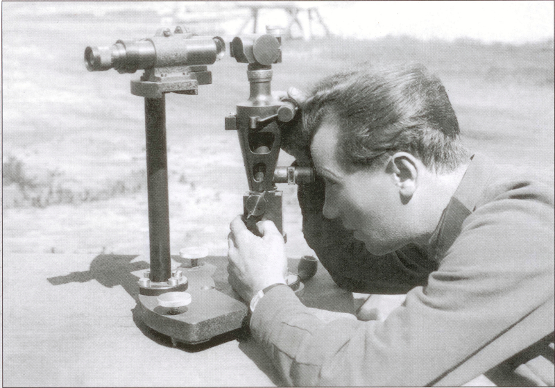 Konstantin Leshchev, an optical device expert, adjusts equipment at Pulkovo Heights in 1942. Photo courtesy of ITMO&rsquo;s Historical Museum
