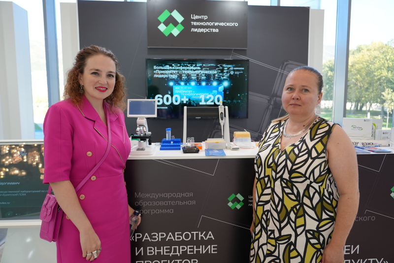 Polina Rudakovskaya and Anna Orlova at the stand of ITMO's contrast agent for ultrasound diagnostics. Credit: Bioprom
