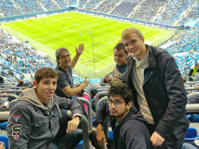 Serhan Agrali (second from left) and fellow ITMO students attend a Zenit-Benfica football game at Gazprom Arena, St. Petersburg. Photo courtesy of Serhan Agrali